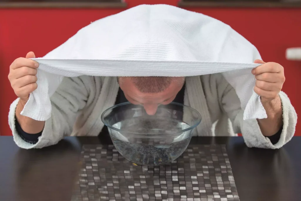 Steam inhalation for congestion relief.